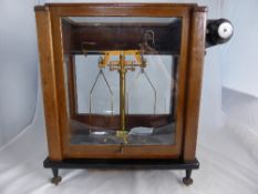 A set of Stanton Morden Analytical Scales, in the original oak case with the coil weights. (good