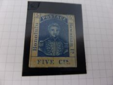A blue album of older all-world stamps including some scarce material, eg. France 1849 15c green (