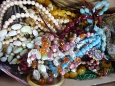 A Collection of miscellaneous Jewellery including necklaces, brooches, vintage silk 1920`s handbag.