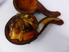 A hand carved Meerschaum pipe depicting a lady, in the original case  (w a f )