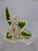 A Royal Doulton Porcelain Study depicting Dahlia and Hosta Cristula.