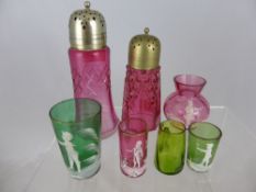 A collection of miscellaneous glass including a Cranberry Mary Gregory vase and beaker, two green