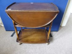 Dark Oak Ercol Drop Leaf Tea Trolley, three tier on castors 73 x 95 x 77 cms.