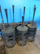 Three antique wrought iron fire beacon baskets, approx. 48 cms. high, 23 cms. diameter, the