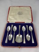 Solid Silver Presentation Set, containing six coffee spoons and a caddy spoon. Sheffield hallmark,