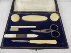 An Ivory Manicure Set, in the original presentation box.