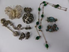 A quantity of costume jewellery incl. necklace, brooches, crown brooch, marcasite earrings, silver