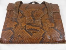 A Vintage Snakeskin Handbag.