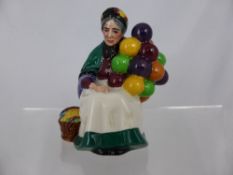 A Royal Doulton Miniature of ?The Old Balloon Seller? H.N.2129.