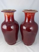 Pair of Chinese Sang De Boeuf Style Vases, Yongzhen character marks to base, approx 50 cms h, 77