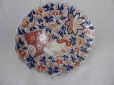 An Antique Chinese Imari Scallop Edge Dish, the dish depicting a tree peony with typical Chinese