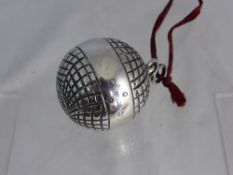 A solid silver Victorian decoration in the form of a golf ball, Edinburgh hallmark, mm J. C. & Co .