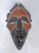 A Cameroon Tribal Mask, approx. 38 cms in length.