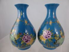 A Pair of Turquoise Chinese Miniature Baluster Vases depicting Oriental pheasants amongst tree