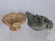 An Antique Clay Oil Lamp, the lamp with hinged lid and lengthened spout, together with one other