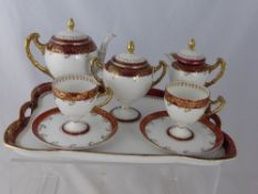 A Porcelain French Coffee Set and Tray, comprising of Milk Jug, Sugar Bowl, Two Coffee Cups and