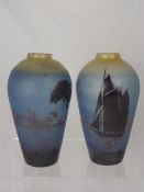 A Pair of Pernaud, Bordeaux Vases, circa 1910-1945, the first vase depicting a tranquil lake scene,