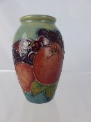 A Moorcroft Vase Finches design, circa 1989, marks to base 11 cms high.