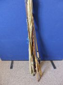 Collection of Vintage Fishing Rod Sections, including two complete rods.