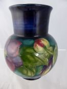 Moorcroft Vase depicting Clematis, factory stamped to base 14 cms in height.