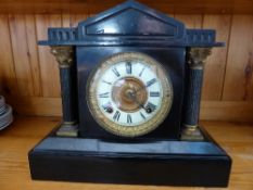 An Ansonia Clock Company Metal Mantle Clock with brass and enamel dial.