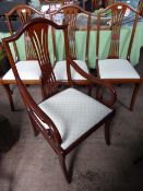 A set of eight oriental fruit wood dining chairs, includes two carvers.