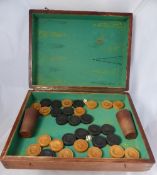 Backgammon set in a wooden box with playing pieces, shakers and dice, approx. 46 x 35 x 13 cms when