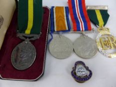 Collection of misc medals including Territorial For Efficient Service 7347426 S.S J.T.K.J Wood R.A.