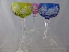 Three Continental Hock Glasses in Blue, Lemon and Cranberry 18 cms high.