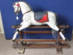 Vintage Trojan Dappled Rocking Horse, with bridle and saddle, approx 100 x 93 cms.
