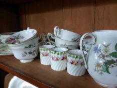 A Part Wedgwood Bone China` Charnwood` comprising six Tea Cups, Sugar Bowl, Milk Jug, Six Saucers,