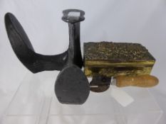 A Cast Iron ""Cobbler`s Triangle"", together with a vintage can opener depicting a bull`s head and