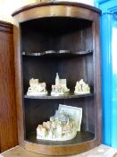 An 18th Century Oak Corner Cupboard with two shelves, 66 x 96 cms.