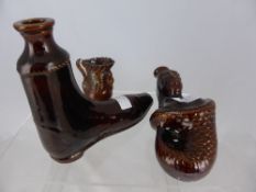 A collection of miscellaneous porcelain including two Victorian Brown Glaze bottles, one in the