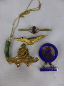 A collection of assorted items including green onyx pendant, silver and enamel ?National Bus