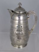 A Victorian Scottish solid silver coffee pot, dated 1880, Edinburgh hallmarked, the highly