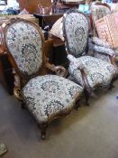 A Victorian Mahogany Armchair, having Rococo decoration, upholstered in floral tapestry fabric