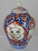 An Antique Chinese Imari Ginger Jar, hand painted phoenix in flight and trees peonies with gilt