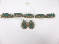 Lady`s Fancy Green Glass Costume Bracelet together with matching earrings.