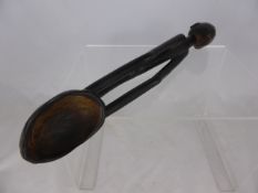 A Congolese Ebony Sacrificial Offering Spoon, approx. 39 cms. in length.