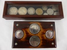 A Small Wooden Case containing silver coins including one New Zealand one Florin 1913, together