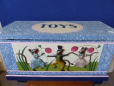 A modern wooden toy box having a central cartouche to the top inscribed ?Toys "", the front