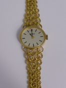 Lady`s Roamer 14 ct Gold, 585 Hallmarked Wrist Watch, the watch having silver face with baton
