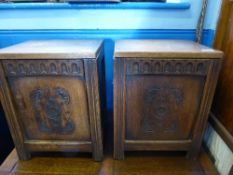 A pair of Edwardian oak bedside cabinets both having lift up tops and decorative carving to the