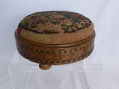 An antique mahogany inlaid foot stool, possibly 19th century, the cushion having decorative beading