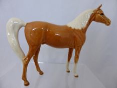 A Beswick Study of a Palomino, 21 cms long x 16 cms high.