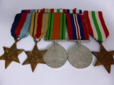 A group of four medals incl. 1939-45 Star, Africa Star, Defence and War Medal together with an