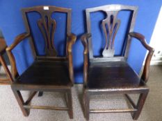 A pair of Edwardian oak elbow chairs (2)