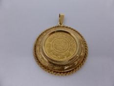 An Arabian Gold Coin in a Yellow Metal Mount 15.8 gms.