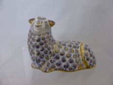 A Royal Crown Derby Figure of a Ram, red stamp to base numbered LIV, 8.5 cms high.